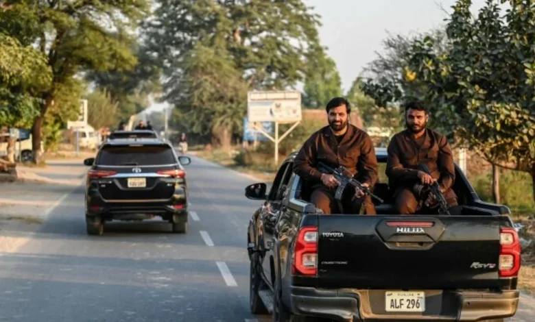 arms display, Hilux pickup, Punjab crackdown